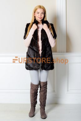 photographic Female fur coat FurStore in the women's fur clothing store https://furstore.shop