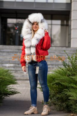 photographic Red short parka with fur of arctic fox in the women's fur clothing store https://furstore.shop