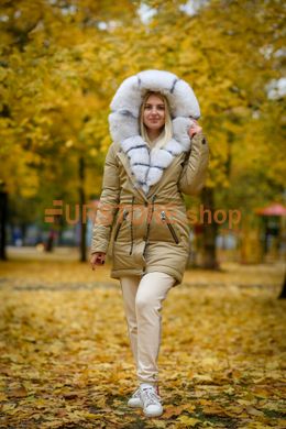 фотогорафия Зимняя женская парка с белым мехом песца альбиноса в магазине женской меховой одежды https://furstore.shop
