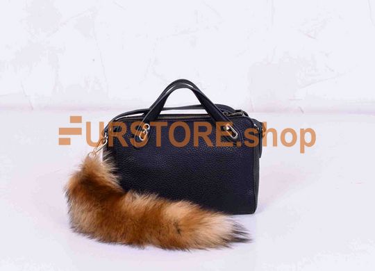 фотогорафия Женская кожаная жилетка с мехом лисы в магазине женской меховой одежды https://furstore.shop