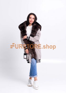 photographic Stylish long fur parka with brown polar fox in the women's fur clothing store https://furstore.shop