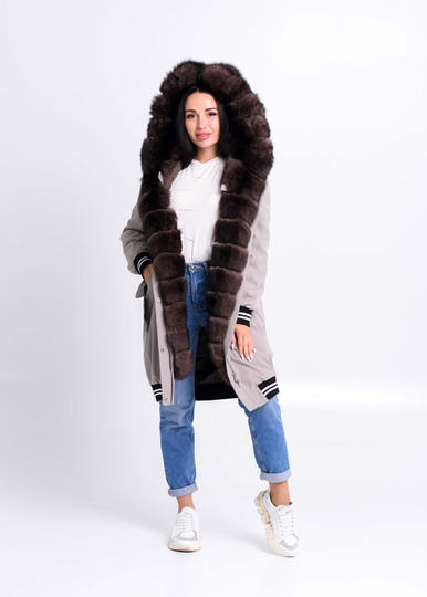 photographic Stylish long fur parka with brown polar fox in the women's fur clothing store https://furstore.shop