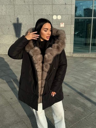 photographic Stylish long fur parka with brown polar fox in the women's fur clothing store https://furstore.shop