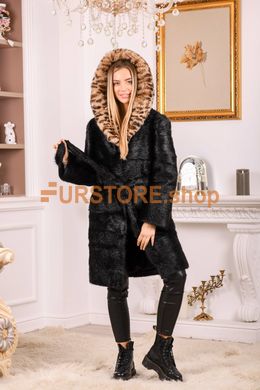 photographic Women's fur coat made of natural fur with a leopard hood in the women's fur clothing store https://furstore.shop