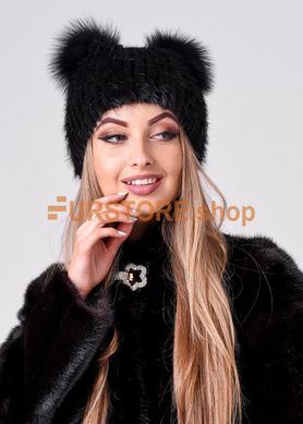 фотогорафия Женская меховая шапка с ушками черного цвета, осенне зимний вариант в магазине женской меховой одежды https://furstore.shop