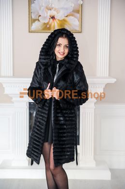 photographic Winter women's fur coat from nutria with a corrugated haircut in the women's fur clothing store https://furstore.shop