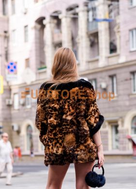 photographic Черные теплые меховые наушники in the women's fur clothing store https://furstore.shop