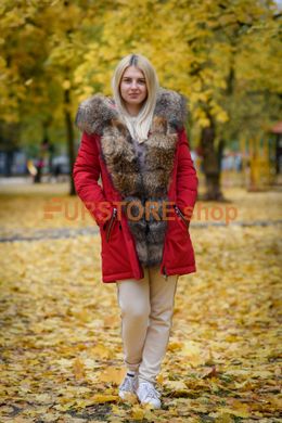 photographic Red winter parka with red fur of raccoon in the women's fur clothing store https://furstore.shop