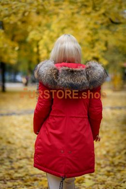 photographic Red winter parka with red fur of raccoon in the women's fur clothing store https://furstore.shop