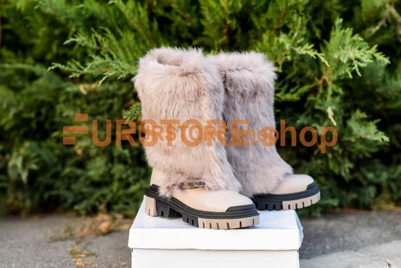 photographic Women's high boots with beige fur, on fashionable soles in the women's fur clothing store https://furstore.shop