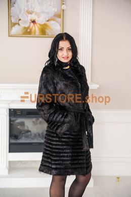 photographic Long fur coat of brown color from a nutria fur with a corrugation in the women's fur clothing store https://furstore.shop